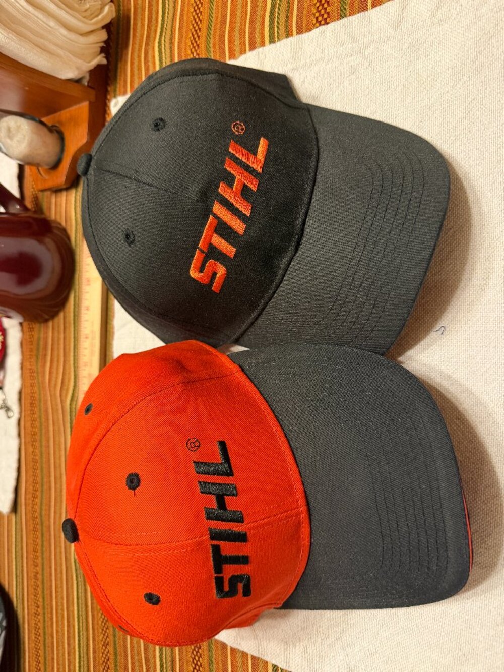 STIHL Adjustable Hats – Set of Two | Black & Orange Embroidered Caps